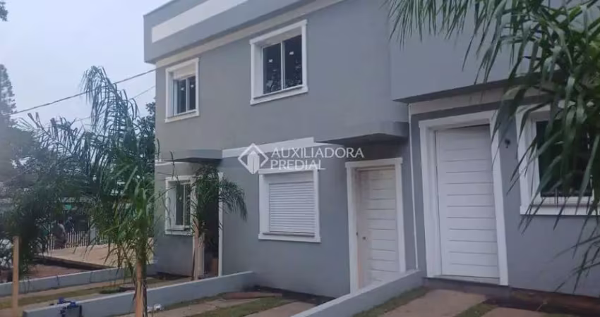 Casa em condomínio fechado com 2 quartos à venda na Rua Frederico Etzberger, 650, Nonoai, Porto Alegre