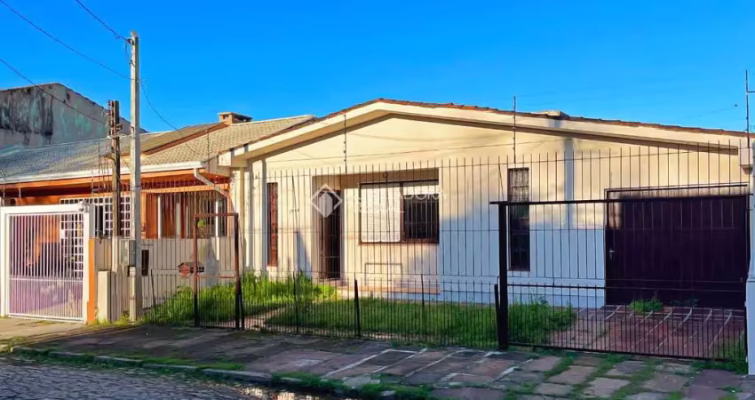 Casa com 3 quartos à venda na Rua dos Guenoas, 1314, Guarujá, Porto Alegre