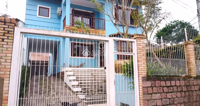 Casa com 3 quartos à venda na Rua Enfermeiro Ventura, 310, Vila Nova, Porto Alegre