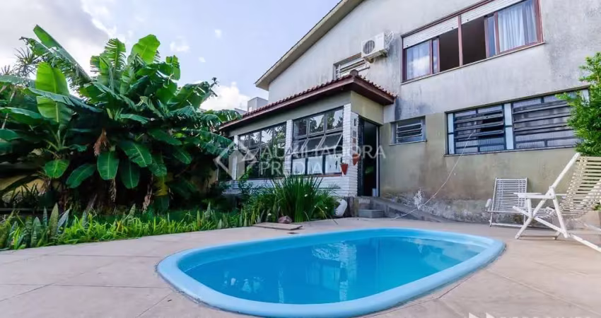Casa em condomínio fechado com 3 quartos à venda na Rua Cariri, 46, Vila Assunção, Porto Alegre