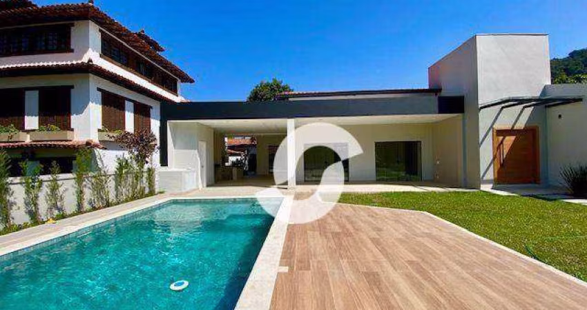 Casa linear, moderna e reformada em condomínio.