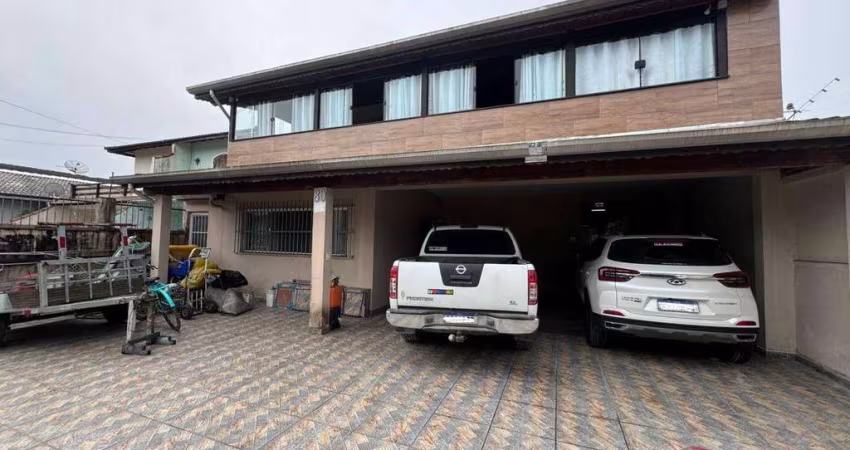 Sobrado com 3 dormitórios à venda, 340 m² por R$ 950.000 - Jardim Indaiá - Bertioga/SP