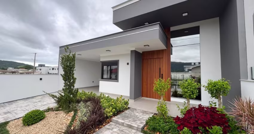 Casa com 3 dormitórios à venda, 128 m² por R$ 850.000,00 - Forquilhas - São José/SC