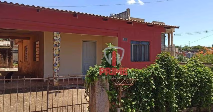 Casa a venda na Vila Brasil em Londrina. Com 2 quartos, sala, cozinha, banheiro, área de serviço, 1 vaga de garagem coberta, quintal amplo para vários