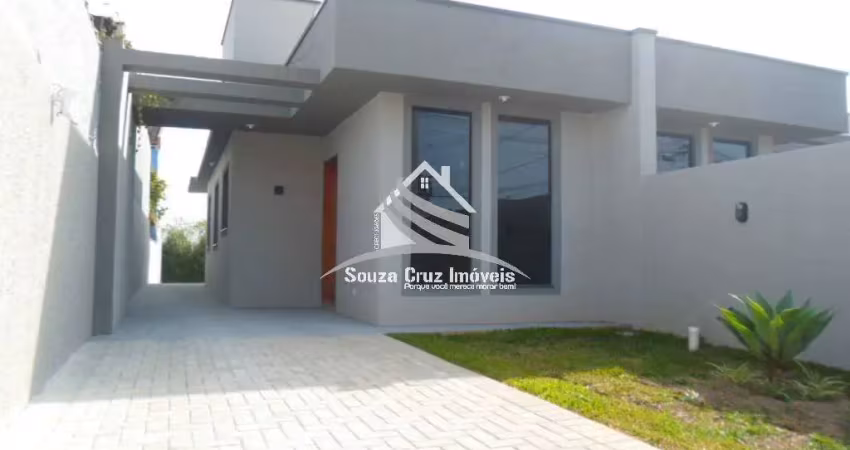 Casa com 03 dormitórios (01 suíte) - frente para rua - amplo terreno.