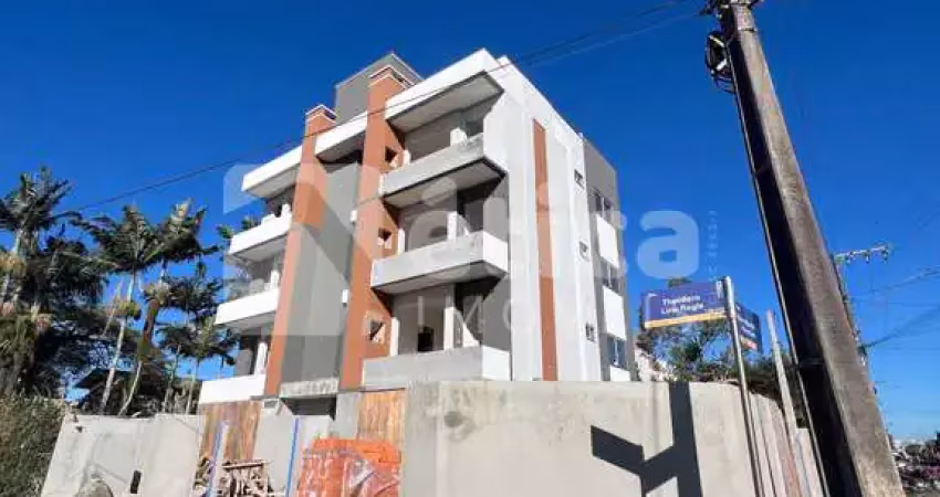 Seu novo lar com 2 dormitorios e churrasqueira a carvão