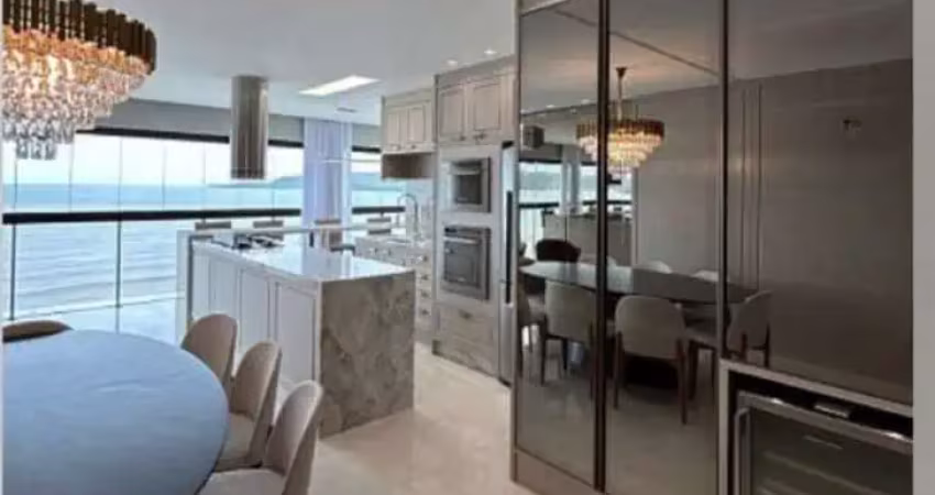 Apartamento frente mar, semi mobiliado, 04 suítes, 04 vagas, meia praia em itapema - sc