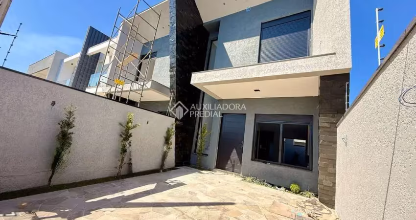 Casa com 3 quartos à venda na Rua Luis Alberto Ribeiro de Castro, 141, Estância Velha, Canoas
