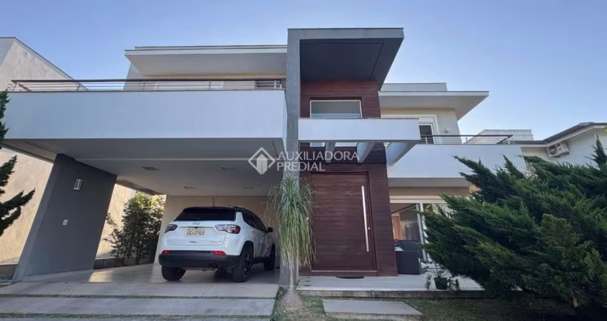 Casa em condomínio fechado com 3 quartos à venda na Avenida Açucena, 50, Estância Velha, Canoas