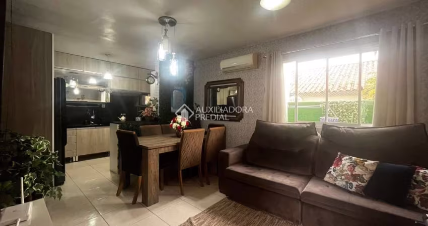 Casa em condomínio fechado com 2 quartos à venda na Irmã Maria Hiltgardis, 376, Olaria, Canoas