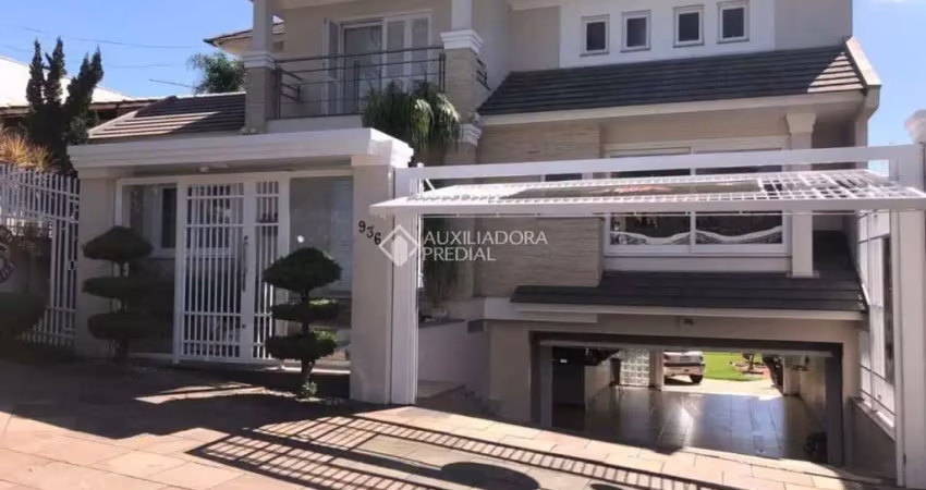 Casa com 4 quartos para alugar na Rua Araguaia, 936, Igara, Canoas