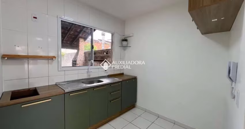 Casa em condomínio fechado com 2 quartos para alugar na Rua dos Guaramirins, 303, Igara, Canoas