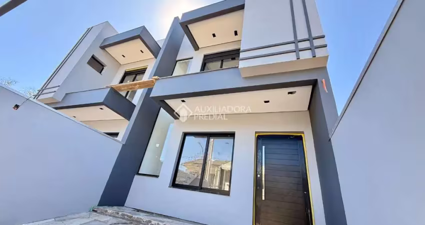 Casa com 3 quartos à venda na Rua Doutor Iran Maciel, 310, Estância Velha, Canoas