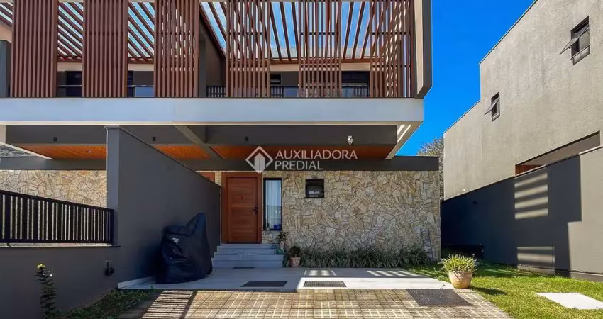 Casa em condomínio fechado com 3 quartos à venda na Rodovia Doutor Antônio Luiz Moura Gonzaga, 3156, Rio Tavares, Florianópolis
