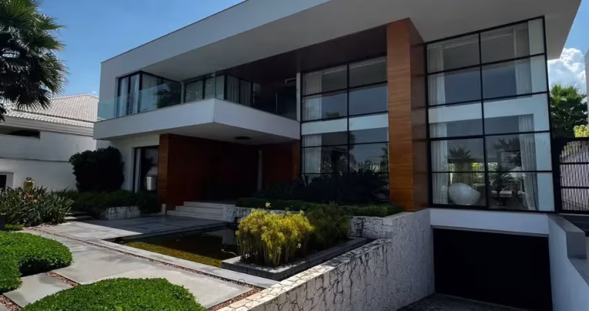 Casa contemporânea mobiliada com 5 suítes no condomínio mansões