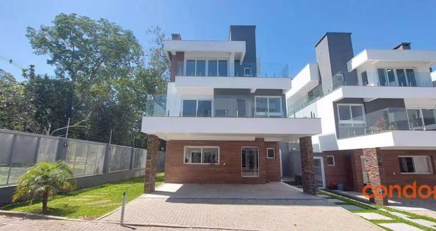 Casa com 4 dormitórios para alugar, 300 m² por R$ 18.500,00/mês - Pedra Redonda - Porto Alegre/RS