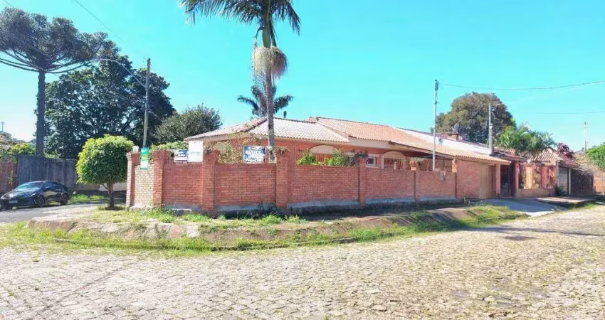 Casa com 3 dormitórios para alugar, 139 m² por R$ 4.609,00/mês - Guarujá - Porto Alegre/RS