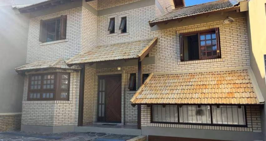 Casa com 4 dormitórios para alugar, 300 m² por R$ 8.165,00/mês - Aberta dos Morros - Porto Alegre/RS