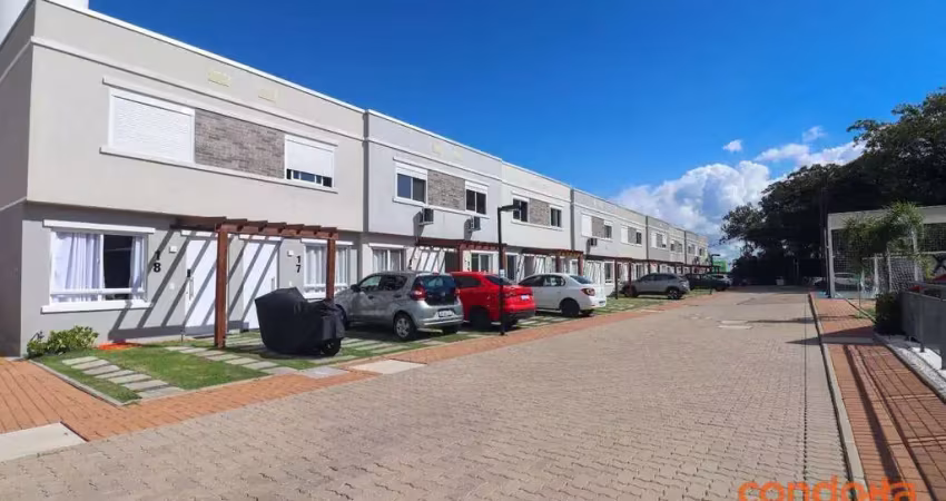 Casa com 2 dormitórios para alugar, 87 m² por R$ 2.604,70/mês - Vila Nova - Porto Alegre/RS