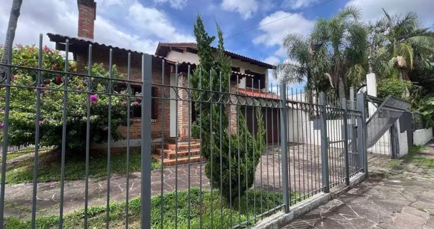 Casa com 4 dormitórios para alugar, 242 m² por R$ 6.340,00/mês - Partenon - Porto Alegre/RS