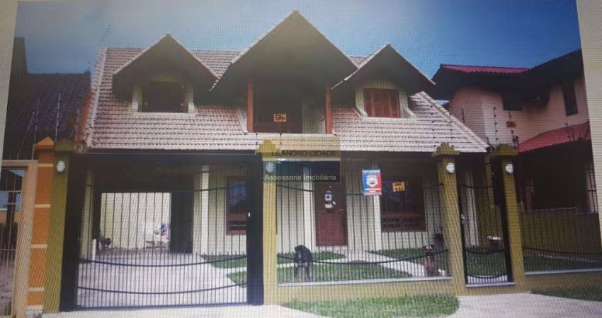 Casa 3 dormitórios à venda no Bairro Rubem Berta com 306 m² de área privativa