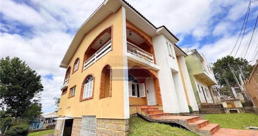 Casa 3 dormitórios à venda no Bairro Centro com 331 m² de área privativa - 2 vagas de garagem