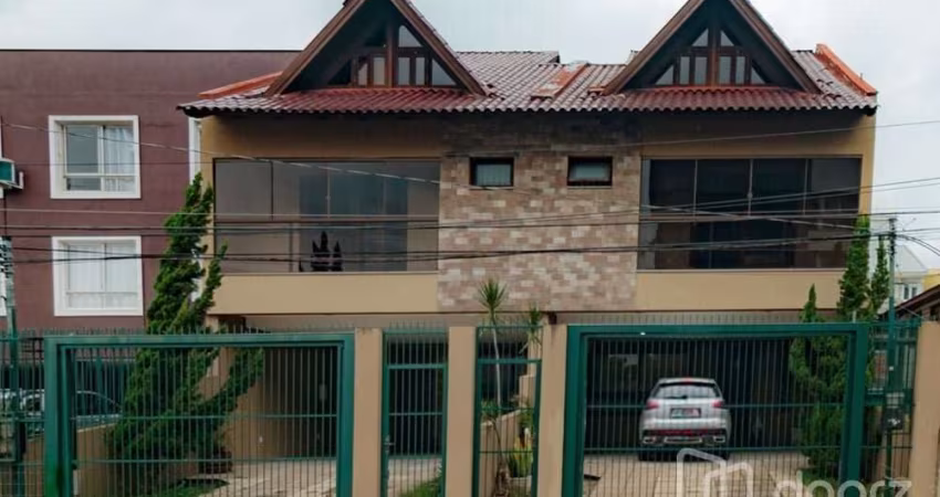 Casa com 3 quartos à venda na Rua Dom Jaime de Barros Câmara, 705, Sarandi, Porto Alegre