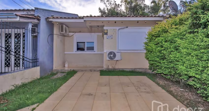 Casa com 2 quartos à venda na Rua Pedro Faria, 570, Hípica, Porto Alegre