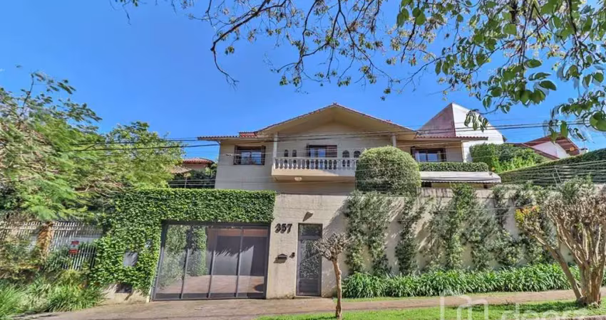 Casa com 4 quartos à venda na Rua Felipe Becker, 357, Três Figueiras, Porto Alegre