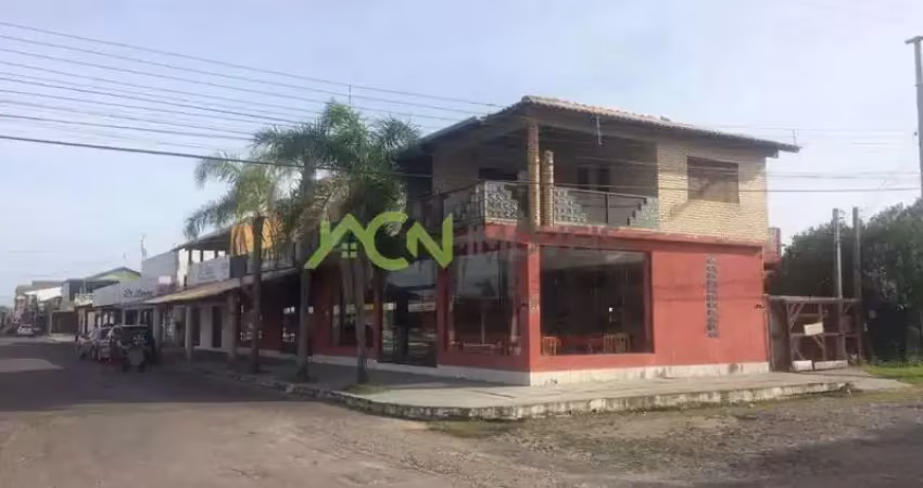 Prédio residencial e comercial em terreno de esquina, na av mariluz, em imbé