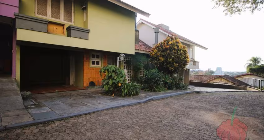 Casa em condomínio fechado com 3 quartos à venda na Rua Padre João Batista Reus, Vila Conceição, Porto Alegre