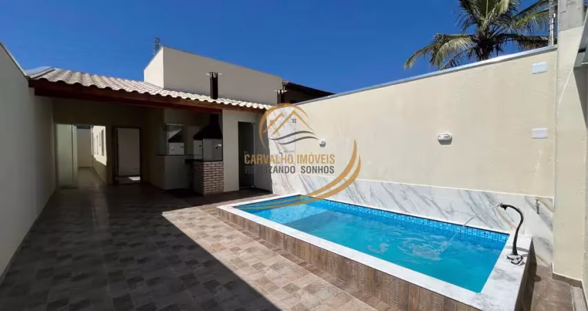 Linda casa geminada lado pista 600 metros do mar com piscina e churrasqueira em itanhaém!