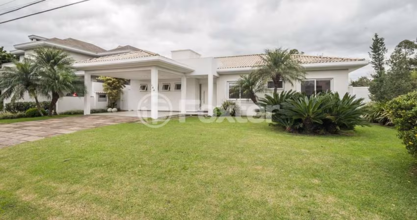 Casa em condomínio fechado com 3 quartos à venda na Avenida Juca Batista, 8000, Belém Novo, Porto Alegre