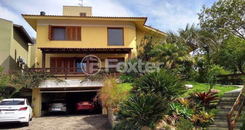 Casa em condomínio fechado com 3 quartos à venda na Rua Adriano Pereira da Silva, 311, Vila Nova, Porto Alegre