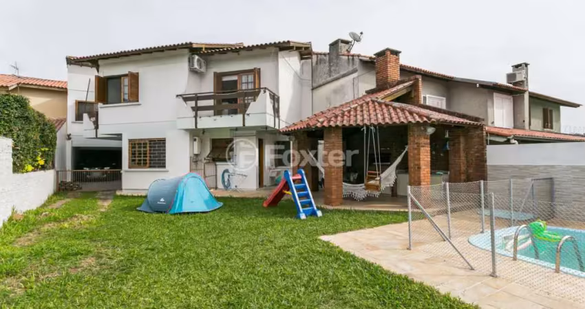 Casa com 5 quartos à venda na Rua Fortunato Della Casa, 35, Espírito Santo, Porto Alegre