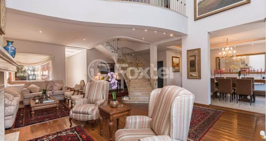 Casa com 4 quartos à venda na Rua Souza Lobo, 27, Vila Jardim, Porto Alegre