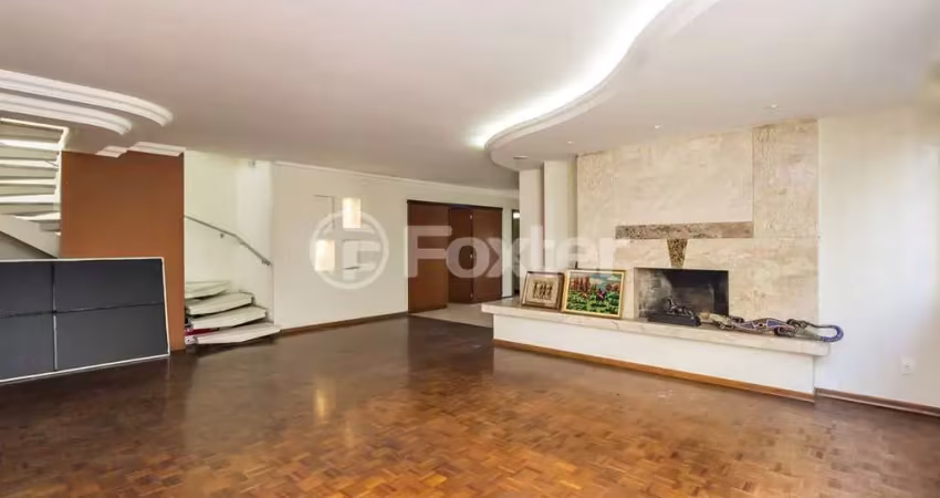 Casa com 5 quartos à venda na Avenida General Barreto Viana, 793, Chácara das Pedras, Porto Alegre