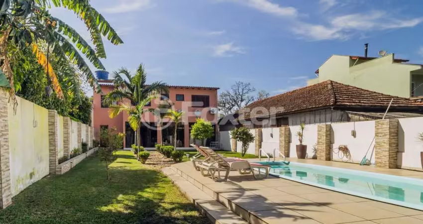 Casa com 3 quartos à venda na Rua Humberto de Campos, 1267, Partenon, Porto Alegre