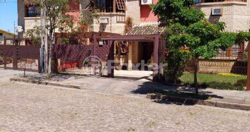 Casa com 3 quartos à venda na Rua Jacundá, 633, Guarujá, Porto Alegre