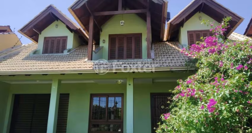Casa com 3 quartos à venda na Rua Santo Expedito, 233, Parque Santa Fé, Porto Alegre