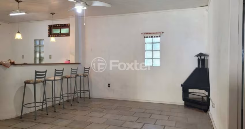 Casa com 2 quartos à venda na Rua Lauro Rodrigues, 405, Parque Santa Fé, Porto Alegre