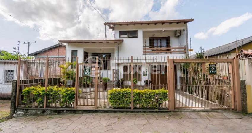 Casa com 4 quartos à venda na Avenida Frei Henrique de Coimbra, 84, Vila Ipiranga, Porto Alegre