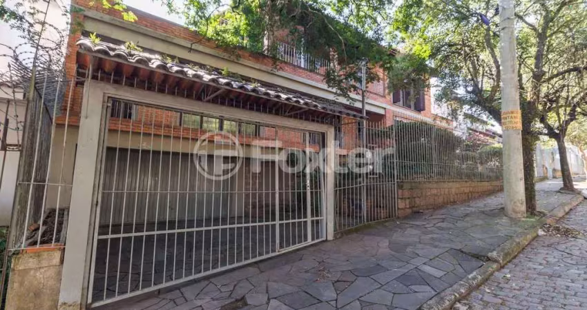 Casa com 4 quartos à venda na Rua Fonseca Guimarães, 34, Medianeira, Porto Alegre