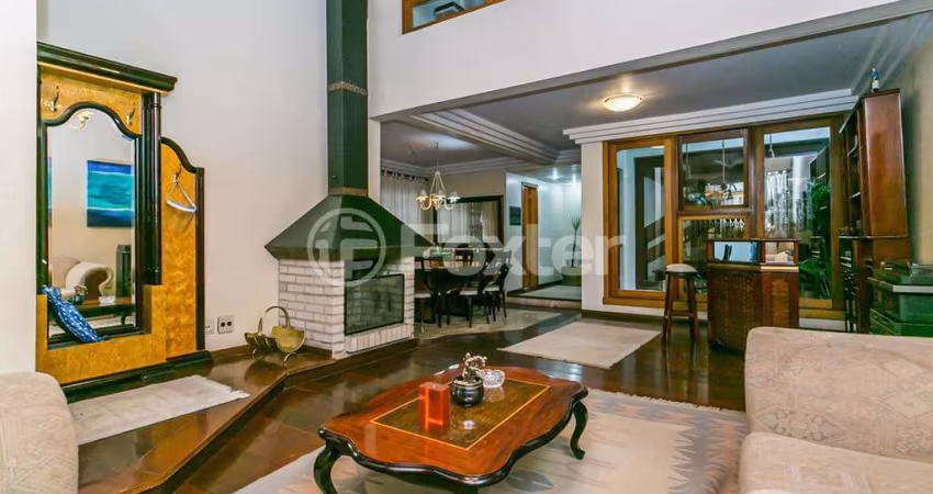 Casa com 4 quartos à venda na Rua José Scutari, 294, Passo da Areia, Porto Alegre