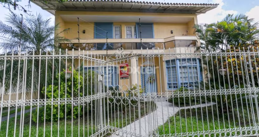Casa com 3 quartos à venda na Travessa Trindade, 40, Jardim Lindóia, Porto Alegre