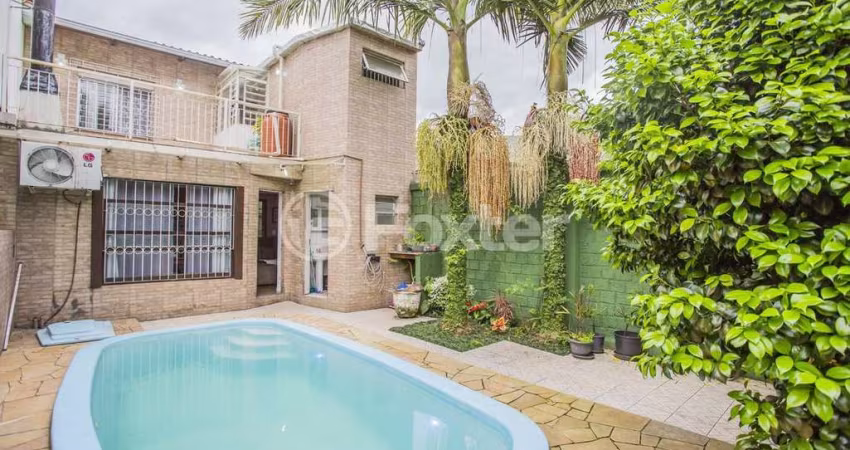 Casa com 4 quartos à venda na Rua Evangelina Porto, 140, Vila João Pessoa, Porto Alegre