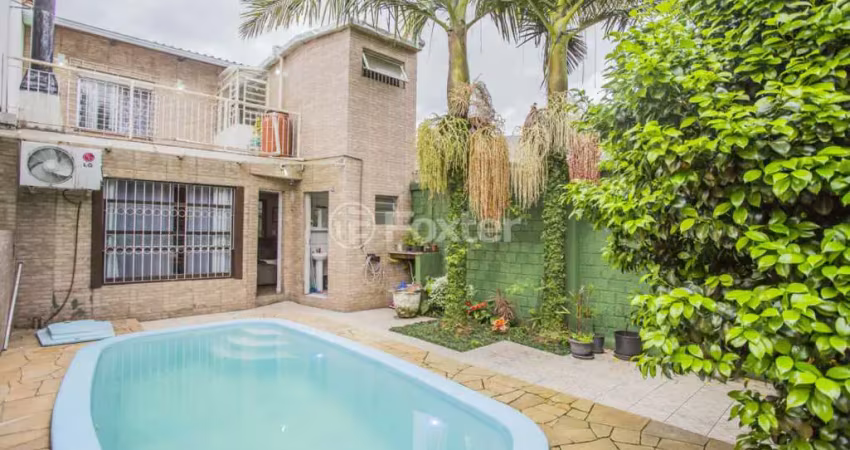 Casa comercial com 3 salas à venda na Rua Evangelina Porto, 140, Vila João Pessoa, Porto Alegre