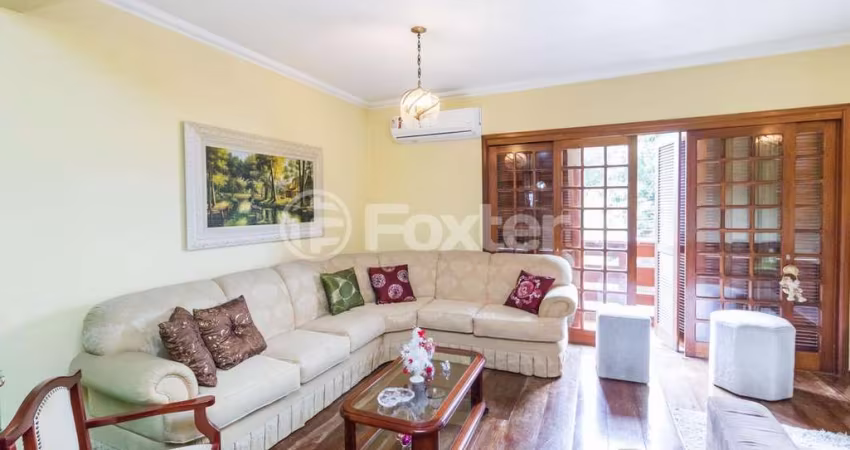 Casa comercial com 2 salas à venda na Rua Arabutan, 599, Navegantes, Porto Alegre