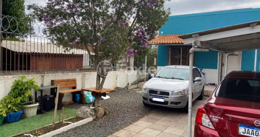 Casa com 3 quartos à venda na Rua Amapá, 158, Vila Nova, Porto Alegre