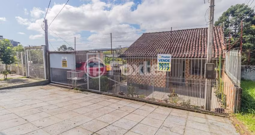 Casa com 3 quartos à venda na Avenida da Cavalhada, 5508, Cavalhada, Porto Alegre